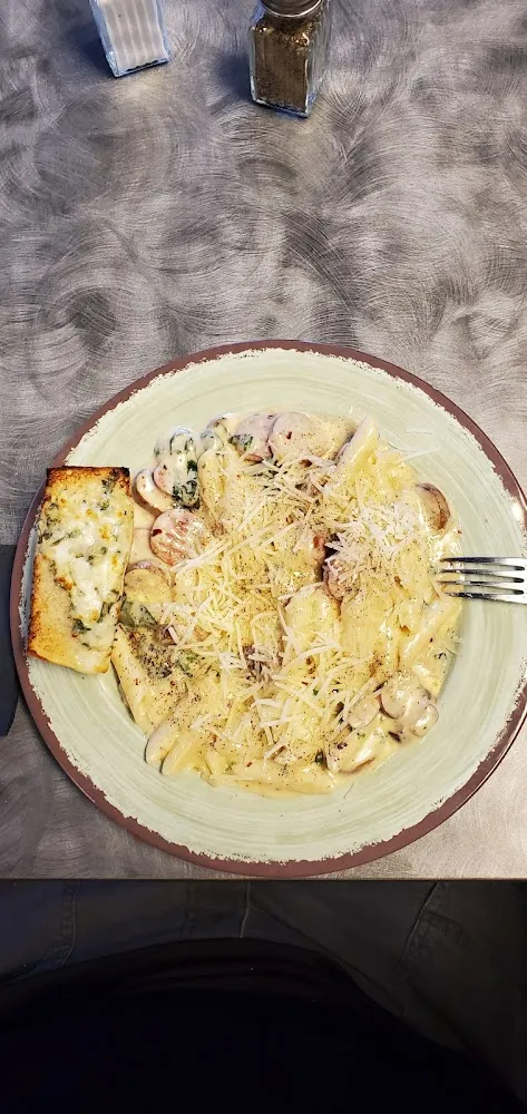 Sausage and Pasta in a Spicy Garlic Alfredo Sauce
